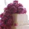 Pink cake with purple flowers