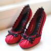 Rouched red satin pumps with black ribbon bow and ruffled ribbon detail