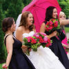 Bridesmaids hailing a cab