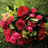Vibrant red and hot pink bouquet with roses