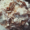 Glam bridal bouquet with champagne fabric flowers and folds, pearl flowers and jeweled accenst.