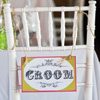 Rustic wedding theme with Bride and Groom-specific chairs