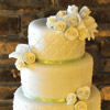 Quilted tier cake with green ribbon trim