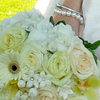 Springtime bouquet with white daisies, blush, yellow and white roses