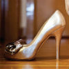 Metallic gold peep toe with rose bud detail on toe