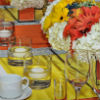 Fall-themed table decor with orange, white and yellow floral centrepieces and orange runners with jewel accents.