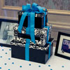 Elegant gift table with stacked box envelope holder