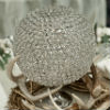Crystal ball centerpieces with rustic accents