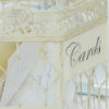 Bird cage envelope holders for a vintage-themed wedding.