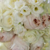 Pastel bridal bouquet with white roses and light pink peonies.