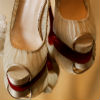 Open toe Christian Louboutin pumps with sheer champagne ruching