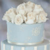 Romantic floral tier cake with metallic stencil design