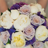 Vibrant bouquet with violet hydrangea, light purple roses and white peonies