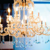 Gold chandelier adds classic elegance to reception décor