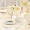 All white reception décor with vintage feel