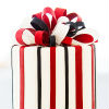 Modern three tier red, black and white cake with fondant LOVE, X's and O's and present bow accents