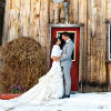 bride and groom outside the barn
