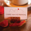 Wine cork place card with orange petal table accents