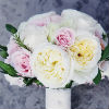 Simple bouquet with white peonies, pink roses and green leaf accents.