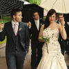bridal party walking in the rain